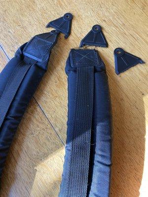 Shoulder straps and molded plastic mounts that have broken off