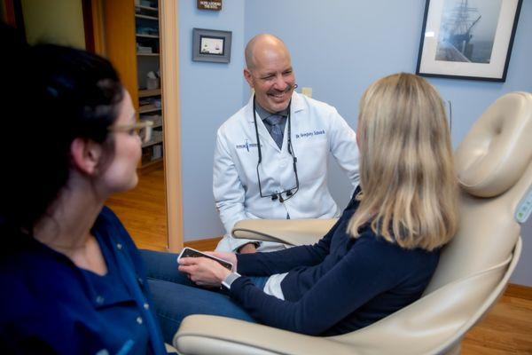 Dr. Gregory Toback talking with a patient