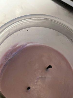 Lilac Candle with less than 1/5 left to burn.