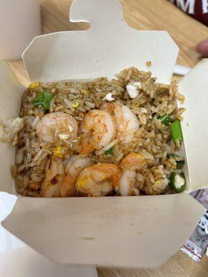 Shrimp fried rice and the shrimp is not just on top it is throughout the entire container.