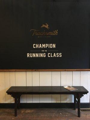 Entranceway decal in Tracksmith's Newbury Street Trackhouse