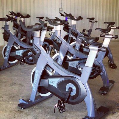 Uses Stages indoor spin bikes to do Rhythmic Spin classes.