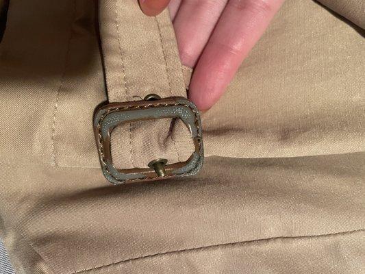 damaged jacket buckle- paint stripped off