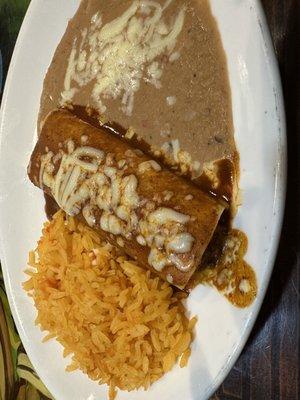 Spanish rice, enchiladas and refried beans