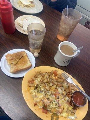 Spanish omelette with home fries and toast