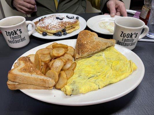 Mushroom, Bacon and Cheese Omelet w/Rye Toast.  Blueberry Pancakes