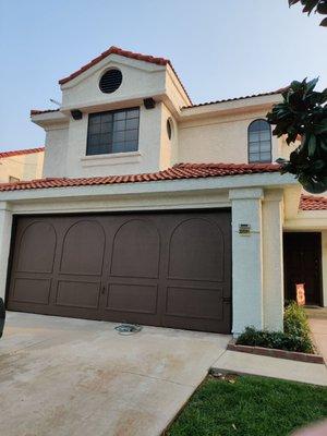 Finished front includes painting decorative wood korbels and garage door. Fresh and renewed!