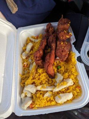 Chicken skewers and chicken fried rice