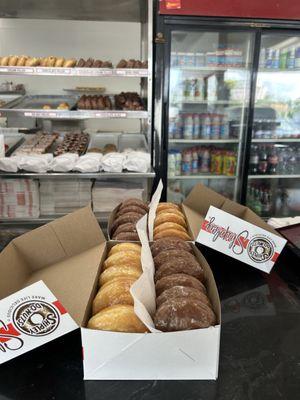 Original glazed and chocolate glazed doughnuts.