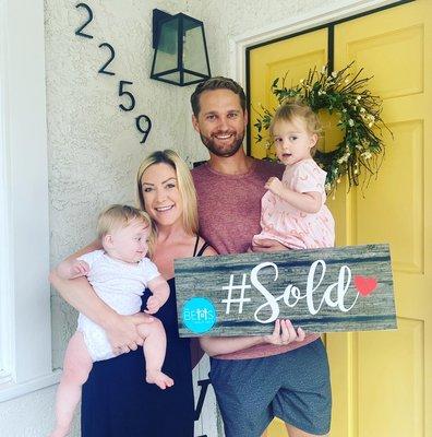 My family and I in front of our new home!