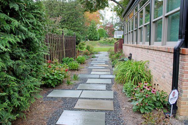 Beautiful walkway installed in an otherwise unusable backyard.