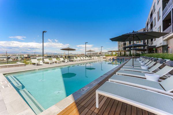 Lounge by the pool while looking out at stunning mountain views