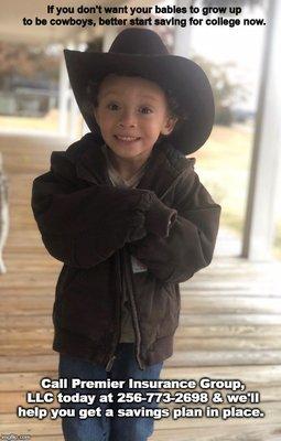 little boy wearing cowboy hat