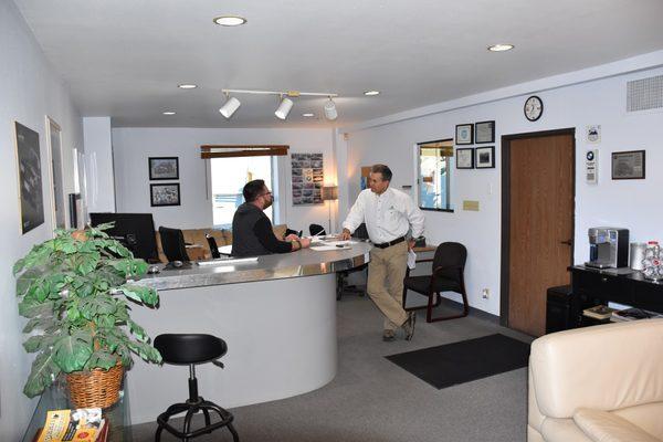 Service Manager Aaron Kennedy and shop owner Mike Tuttle