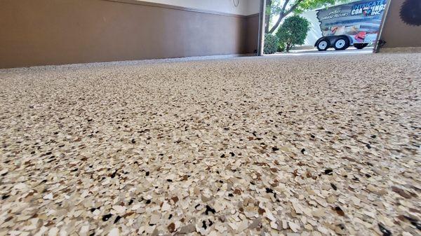 A beautiful finished epoxy garage floor done in Dakota Grey. Professionally installed by Intricate Coatings.