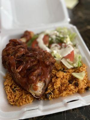 Fried chicken with yellow rice and peas