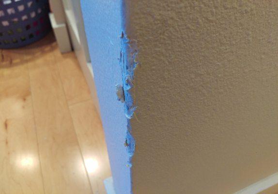 Wall damage caused by Frogbox delivery team. The company did not respond to my emails reporting the damage.