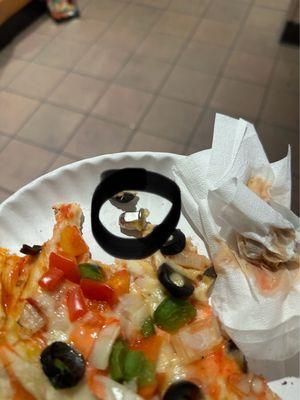 metal piece in pizza