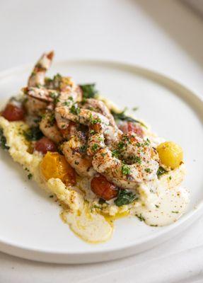 "Our" Shrimp & Grits

Parmesan polenta, sautéed spinach, blistered cherry tomatoes, Florida citrus butter