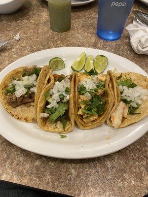 Steak, pork, chicken and shrimp Mexican style tacos.