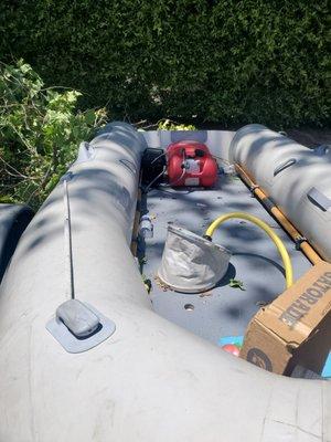 Here is another view of tree branches piled on my INFLATABLE RUBBER boat.