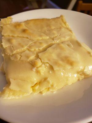 Gooey butter cake oozed all over the plate