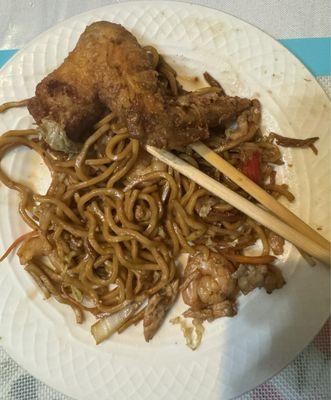 House Lo mein and a chicken wing. (On my plate not the restaurant's)