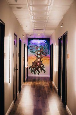 Artwork throughout the Rainbow location elevates each room for the perfect calm.