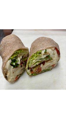 Chicken gourmet wrap
* Grilled chicken, roasted peppers, fresh mozzarella, Romain lettuce, pesto-mayo. On white or wheat wrap