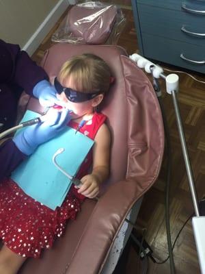 My daughter thinks teeth cleaning is too cool with the nifty glasses they get to wear so the light doesn't hurt their eyes!