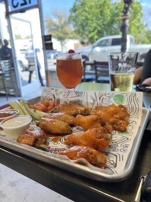 Wings, half spicy Asian , half buffalo. Spicy white claw.