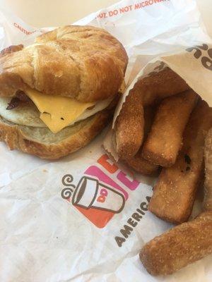 Bacon, egg, and cheese croissant and donut fries.