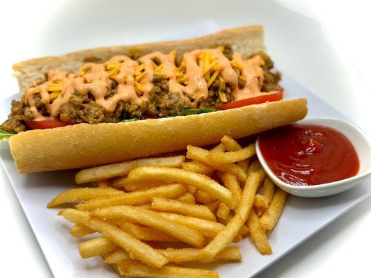 Chopped Cheese- plant based chopped meat with onions, peppers & cheese topped with lettuce, tomatoes, ketchup & mayo served on French bread