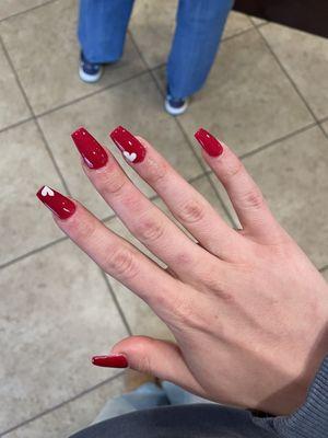 Love coming here! Amazing job. Got these simple but gorgeous valentines nails this morning :)