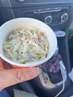 Half full side of cole slaw.