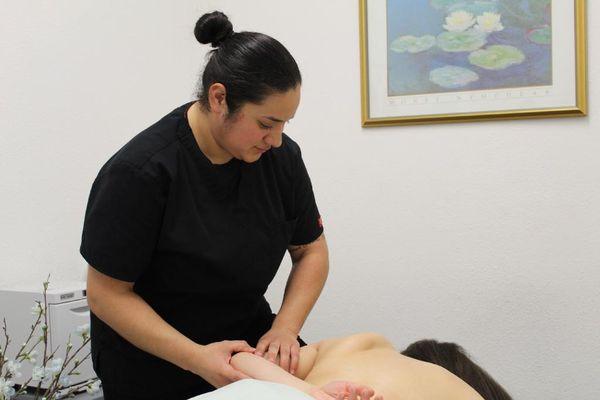 Escondido Massage Therapists - Stretching and  prepping for deep tissue massage.