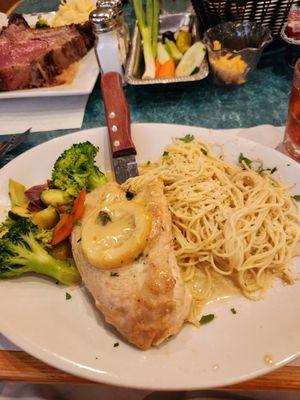 Chicken stuffed with spinach and cheese. Fresh vegetables and pasta.  Tender.. tasty.