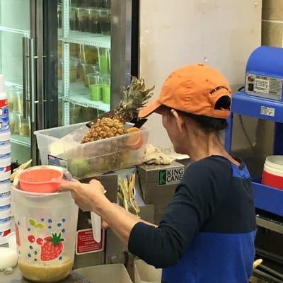 Making fresh sugar cane juice