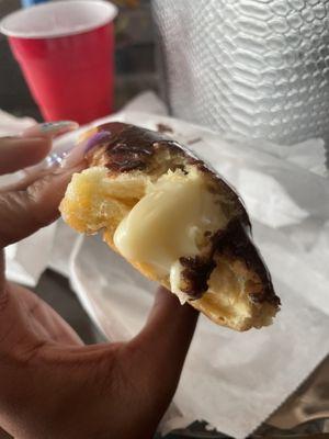 I forget what it's called but the long donut chocolate top and yellow cream