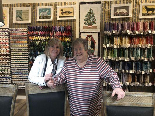 2 needle-pointers enjoying all the new canvases and fibers offered at Northwest Needlepoint!!