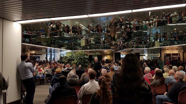 Wide view of the full house and standing room on ground level and 2nd floor