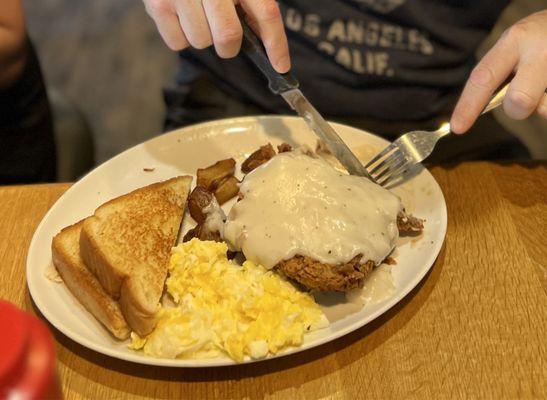 Chicken fried Steak & (scrambled) eggs w/ gravy. $15.99 Tasty gravy!