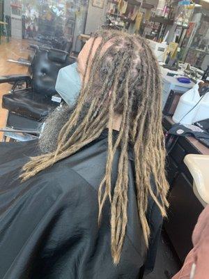 Dreadlock maintenance and upkeep.