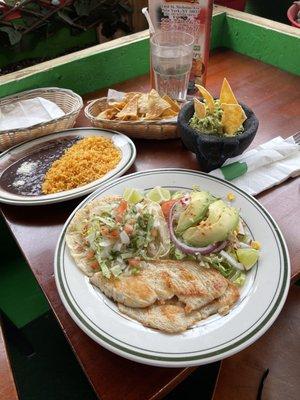 Chicken breast Salad Guacamole Black beans Yellow Rice