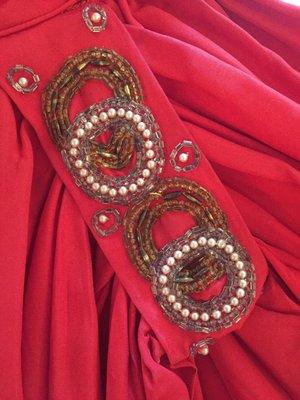 Repaired beading on a vintage 1950's gown.