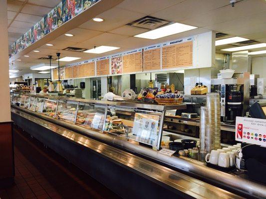 The service counter (note the giant menu)