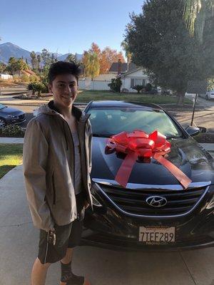 My son's new car. It was so awesome that Will allowed us to borrow the big bow to put on the car.