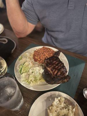 My father in law's meal. Ribeye, salad, baked beans and potato.