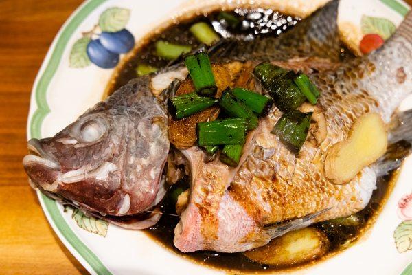 live tilapia, steamed at home