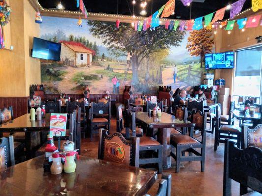 The inside of the restaurant. Here is the mural and decorations I was talking about. It also gives you a sense of the restaurant.